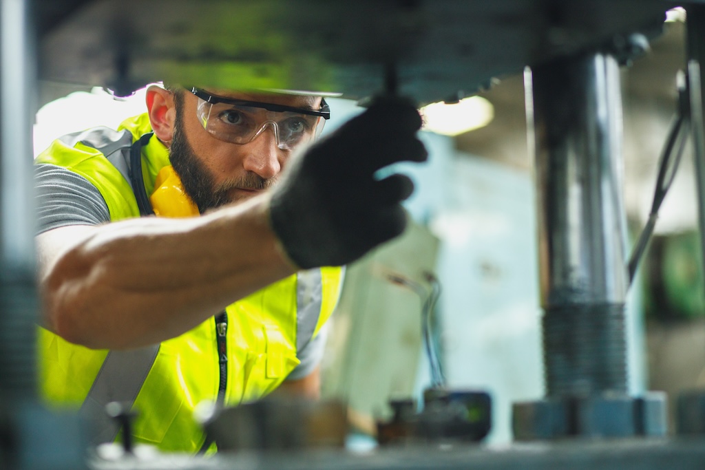 Building inspector reviewing technical data on a tablet