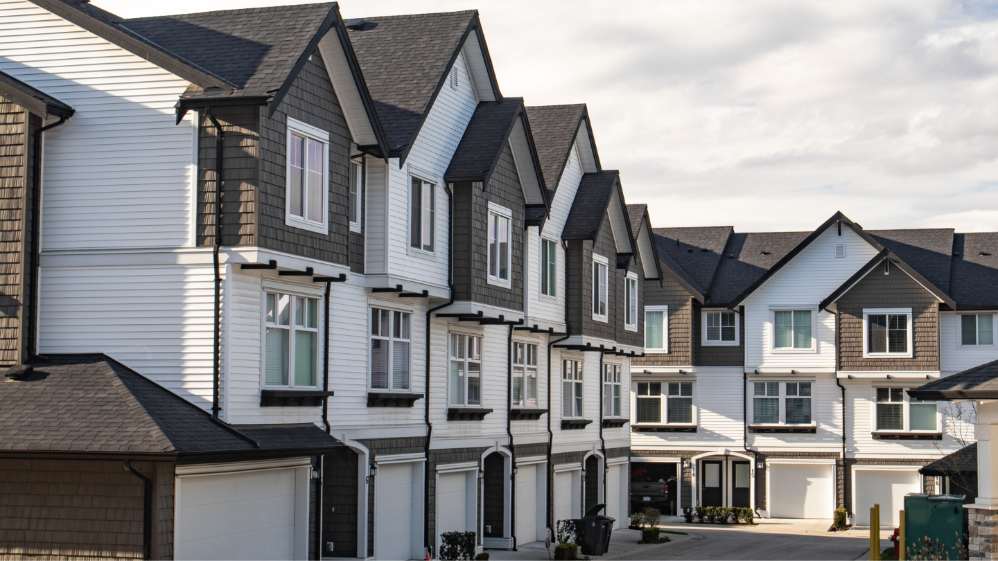 Row of townhouses with landscaped front yards